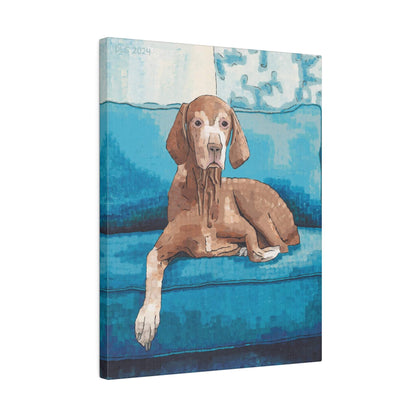 A art print of a dog sitting on a blue couch with a white backdrop.