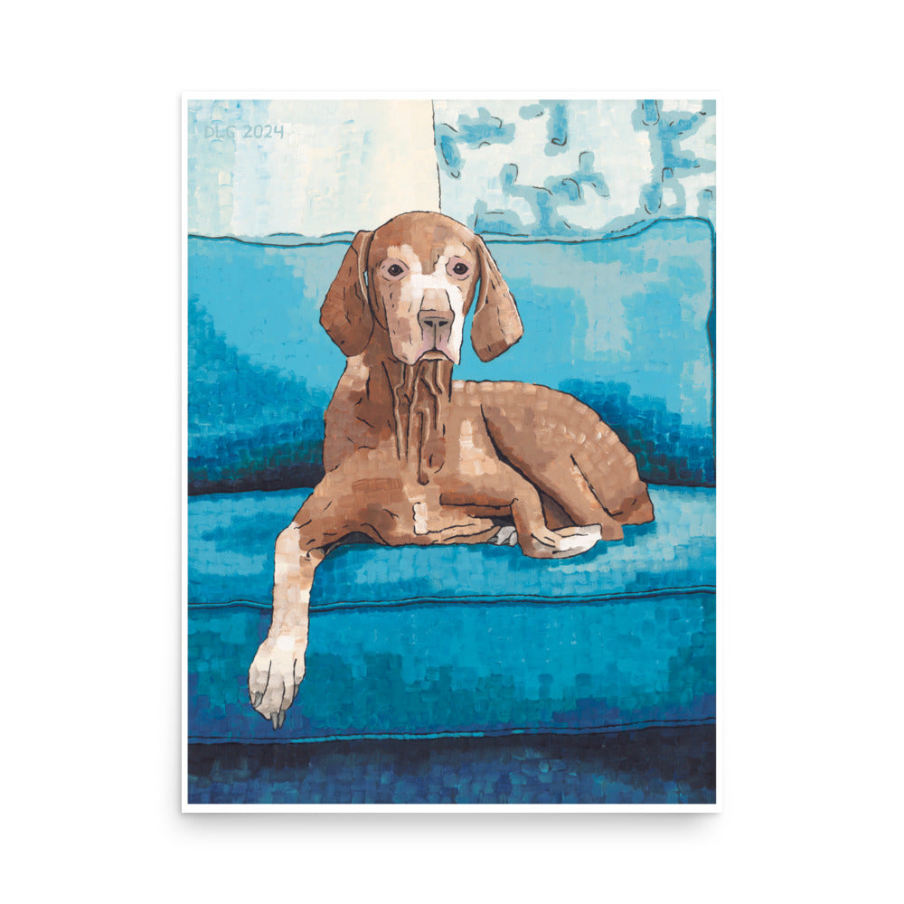 A painting of a dog seated on a blue couch with a white backdrop.